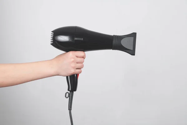 Menina Mão Segurando Secador Cabelo — Fotografia de Stock