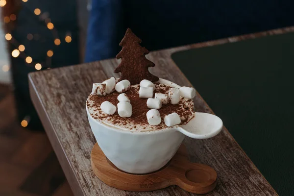 Dessert in a cup with cocoa and marshmallows. Tyramissa desret.
