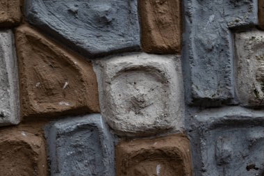 Capture the strength and beauty of a textured stone wall, perfect for backgrounds, architectural designs, or adding a rugged touch to your projects.