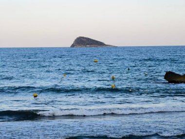 a beautiful shot of a boat and a sea on a sunny day