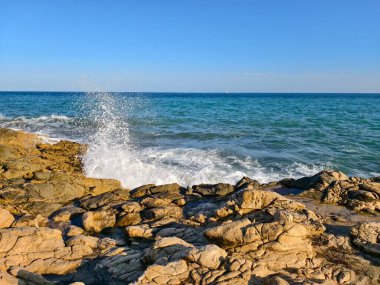 the beautiful sea waves and splashing water on the shore of the black sea