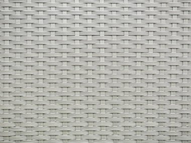 Açık havada sallanan beyaz-gri bir sandalyenin örgü örgüsü. Kopyalama alanı