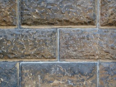 Tarihsel rustik taş duvar düzensiz, kaba bloklar. Yakın plan. Kopyalama alanı.