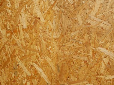 Tahtası tahıllı ve düğümlü açık kahverengi kontrplak. İnşaat malzemesi, ahşap doku, doğal motif. Yakın plan, Kopyalama Uzayı.