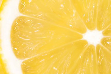 Sulu limon diliminin arka planı, üst manzara. Makro meyveler.