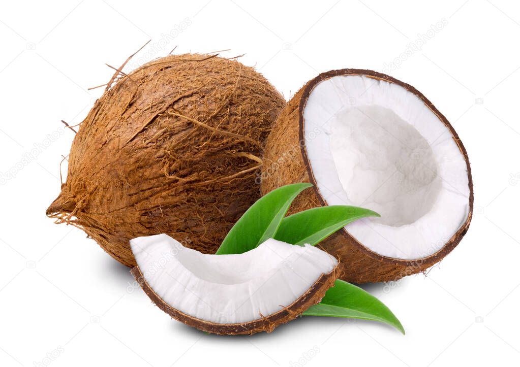 Ripe sweet coconut and coconut halves with palm leaves isolated on white background.