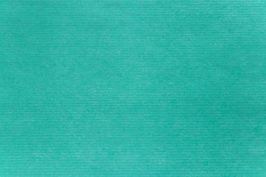 Turkuaz yeşil renkli kâğıt dokusu yakın plan. Yatay bağlanmış sayfa.