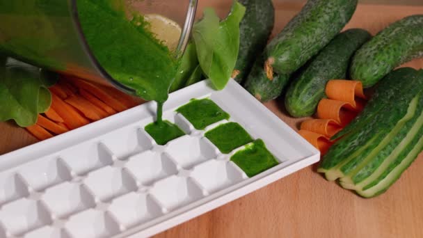 Cooking Frozen Cubes Smoothie Spinach Vegetables Wooden Table — Stock Video