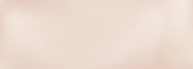 Bej renkli ve yumuşak pembe tonlu yumuşak gül arkaplan. Hassas gül renkli doku güzellik ve moda tasarımları için zarif bir pastel estetik yaratır..