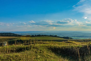 summer landscape of the ukrainian carpathian mountain, the sunset time, view from the top of the hill