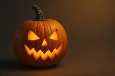 Traditional carved pumpkin glowing in the dark, ideal for Halloween visuals and October celebrations.