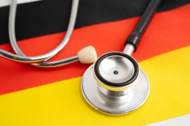 Steteskop, İş ve Finans ile Almanya bayrağı.