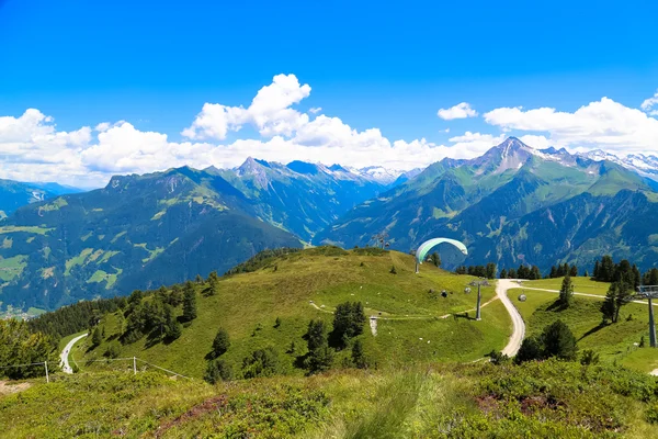 Austrian mountain landscape and paraglider — Stock Photo, Image