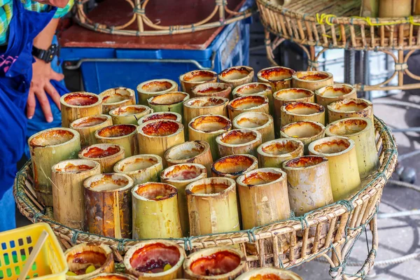 Plenty of thai dessert made of sticky rice put in a bamboo — Stock Photo, Image