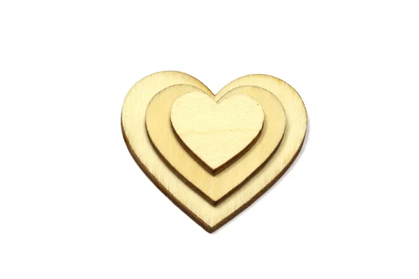 Forma de coração de madeira isolado no fundo branco. símbolo de amor simples — Fotografia de Stock