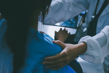 Male doctors shake hands with patients encouraging each other and praying for blessings. To offer love, concern, and encouragement while checking the patient's health. concept of medicine