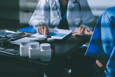 Male doctors shake hands with patients encouraging each other and praying for blessings. To offer love, concern, and encouragement while checking the patient's health. concept of medicine