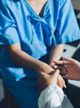 Male doctors shake hands with patients encouraging each other and praying for blessings. To offer love, concern, and encouragement while checking the patient's health. concept of medicine