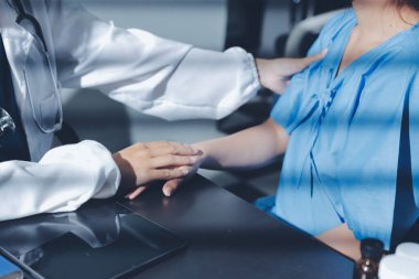 Male doctors shake hands with patients encouraging each other and praying for blessings. To offer love, concern, and encouragement while checking the patient's health. concept of medicine