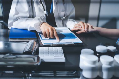 Male doctors shake hands with patients encouraging each other and praying for blessings. To offer love, concern, and encouragement while checking the patient's health. concept of medicine