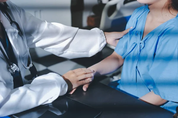 Male doctors shake hands with patients encouraging each other and praying for blessings. To offer love, concern, and encouragement while checking the patient's health. concept of medicine