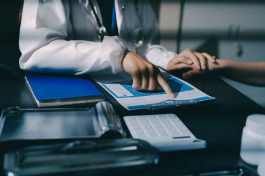 Male doctors shake hands with patients encouraging each other and praying for blessings. To offer love, concern, and encouragement while checking the patient's health. concept of medicine