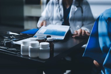 Male doctors shake hands with patients encouraging each other and praying for blessings. To offer love, concern, and encouragement while checking the patient's health. concept of medicine