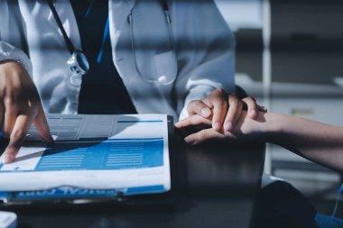 Male doctors shake hands with patients encouraging each other and praying for blessings. To offer love, concern, and encouragement while checking the patient's health. concept of medicine