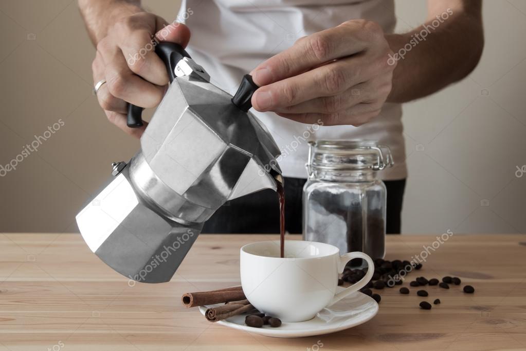 Pouring Coffee Out Of Italian Pot Stock Photo Pouring Coffee Out Of Italian Pot Stock Photo