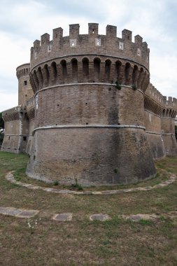 Castle of Giulio II in Ostia Antica Rome and Church clipart