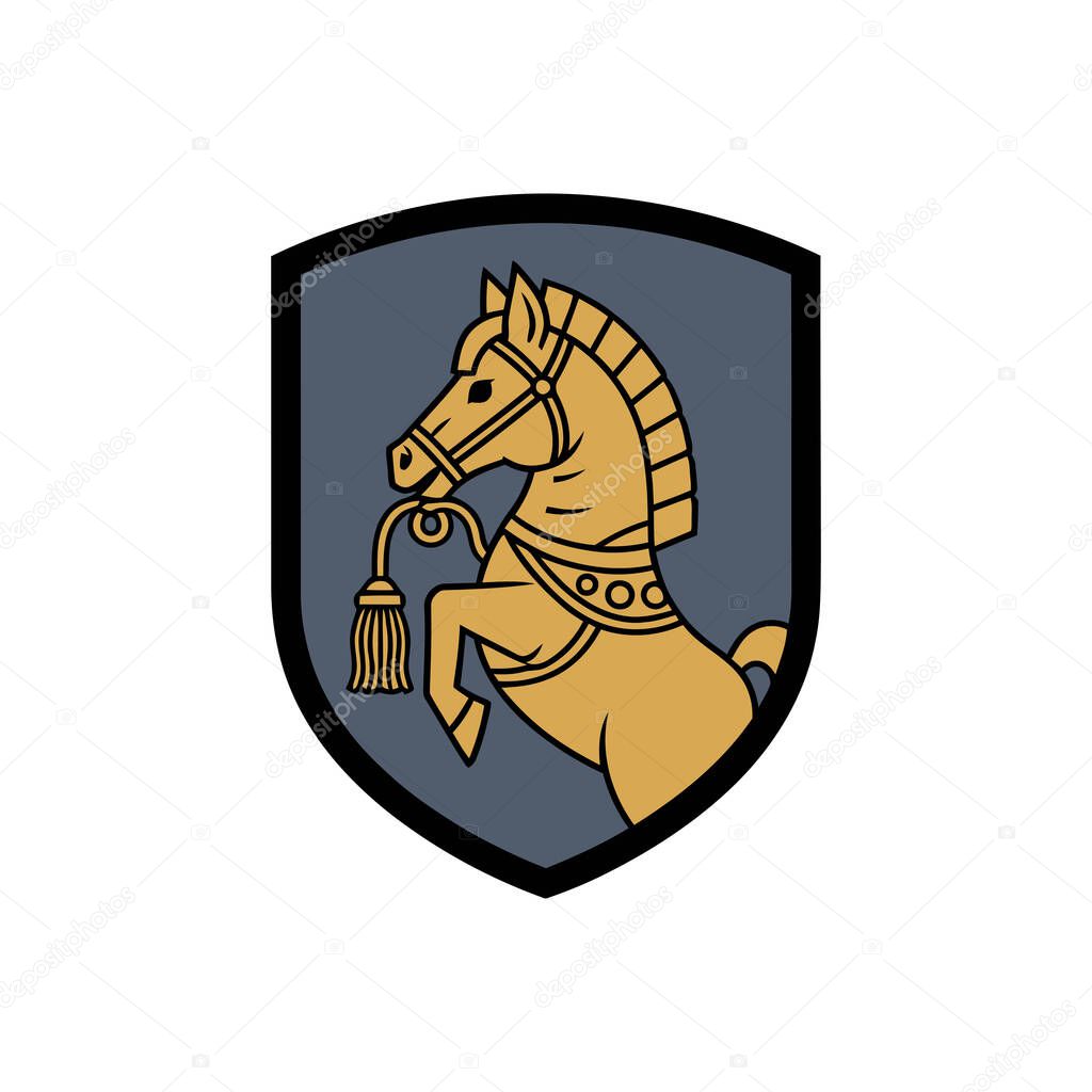A regal golden horse, adorned with intricate harness and tassel, rears up within a dark blue shield, symbolizing strength and nobility.