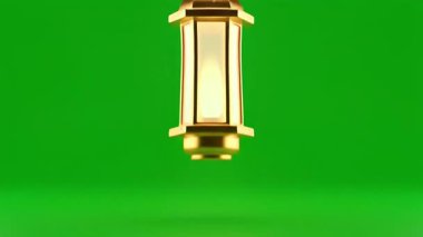 Güzel hazırlanmış altın bir fener canlı yeşil bir ekrana nazikçe sallanıyor. Şenlik ve kutlama projelerine zarafet katmak için mükemmel..