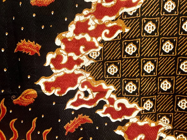 Endonezya, Cirebon 'dan soyut yaprak ve güneş alevi motifli güzel geleneksel Endonezya batik kumaşı. Tekstil, pamuk kumaş, kapaklar, duvar kağıdı, baskı, kartlar ve yapıştırma kitabı için..