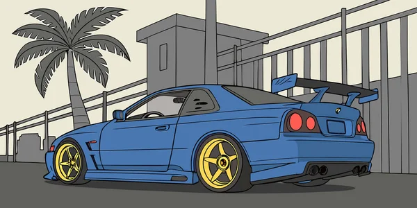 Sarı jantlı mavi spor araba ve arka spoiler, tropik bir şehir sokak sahnesinde, bir muhafız kulübesinin yakınına park edilmiş, palmiye ağaçları ve endüstriyel binaların yer aldığı.