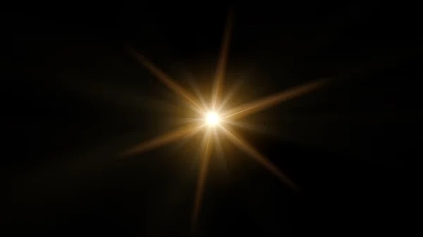 Gul lins effekt med sex strålar på en svart bakgrund. — Stockfoto