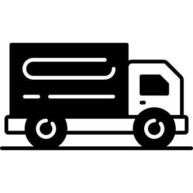 Delivery truck transporting goods along urban roadway