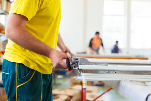 Workers hands assembling windows — Stock Photo, Image