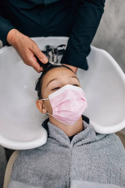 Young Girl Enjoying Hairstyle Treatment While Professional Hairdresser Gently Working — Foto de Stock