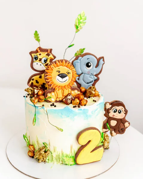 Cake voor kinderen met vrolijke dieren Stockfoto