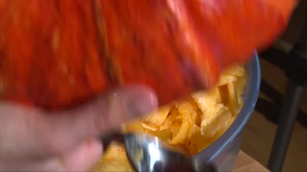 Gutting flesh from pumpkin and shake it out, top view — Stock Video