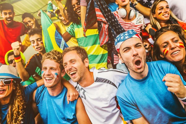 Aficionados de diferentes naciones en el estadio — Foto de Stock