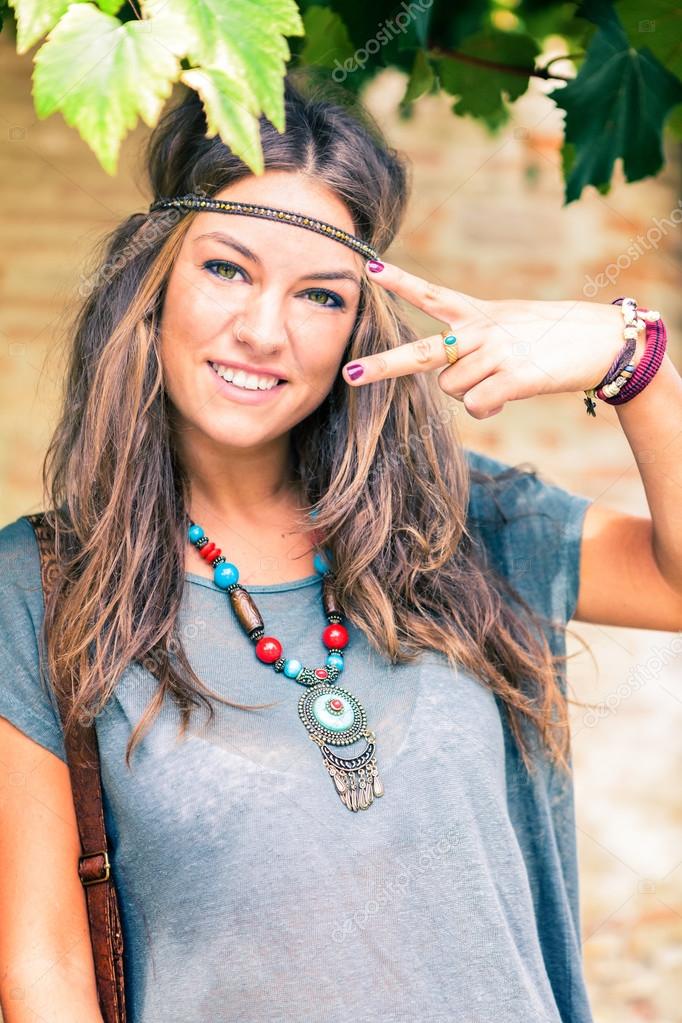Hippie girl with long hair Stock Photo by ©GiorgioMagini 122931350