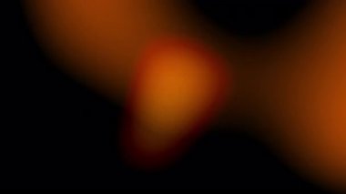 Ilık sarı turuncu sızıntı siyah arka planda pürüzsüz ışık değişimleri, hareket grafikleri ve modern görsel tasarımlar için ideal ışık geçişleri ile örtüşüyor. 4K video