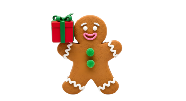 Zencefilli çörek adam elinde siyah bir arkaplanda Noel hediyesi tutuyor.