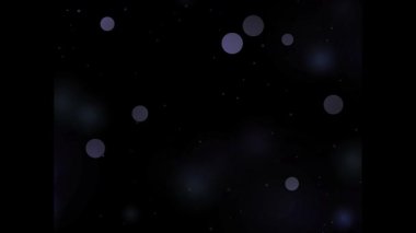 Çemberleri ve yıldızları olan siyah bir arkaplan. Yüksek kaliteli ticari video görüntüleri.