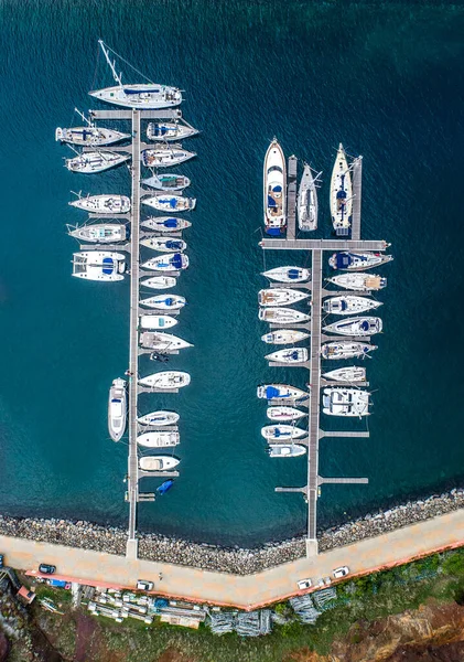 The drone aerial view of sailing yachts moored in marina Quinta do Lorde on coast of the Portuguese island of Madeira — Stock Photo, Image