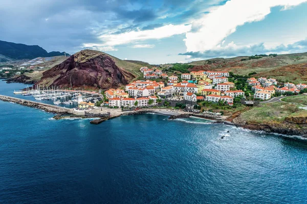 Aerial view of Quinta do Lorde smal village hotel on coast of the Portuguese island of Madeira with small yacht harbour — Stock Photo, Image
