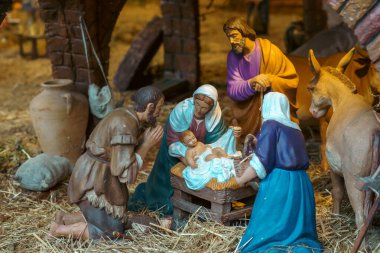 Ceramic figurines representing the birth of jesus at the nativity scene in the Bethlehem portal