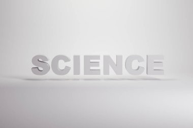 Bilim kelimesi, beyaz arka plan, eğitim araştırması. Metin kavramı.