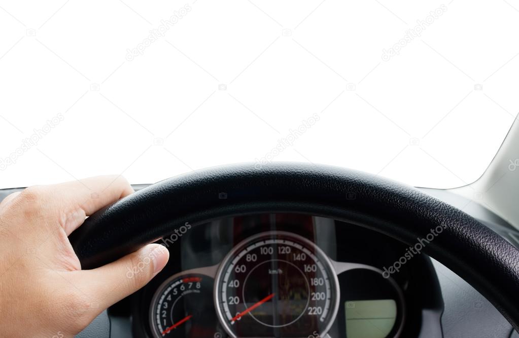 Man's hands of a driver on steering wheel of a minivan car on asphalt road,Inside car dashboard isolated